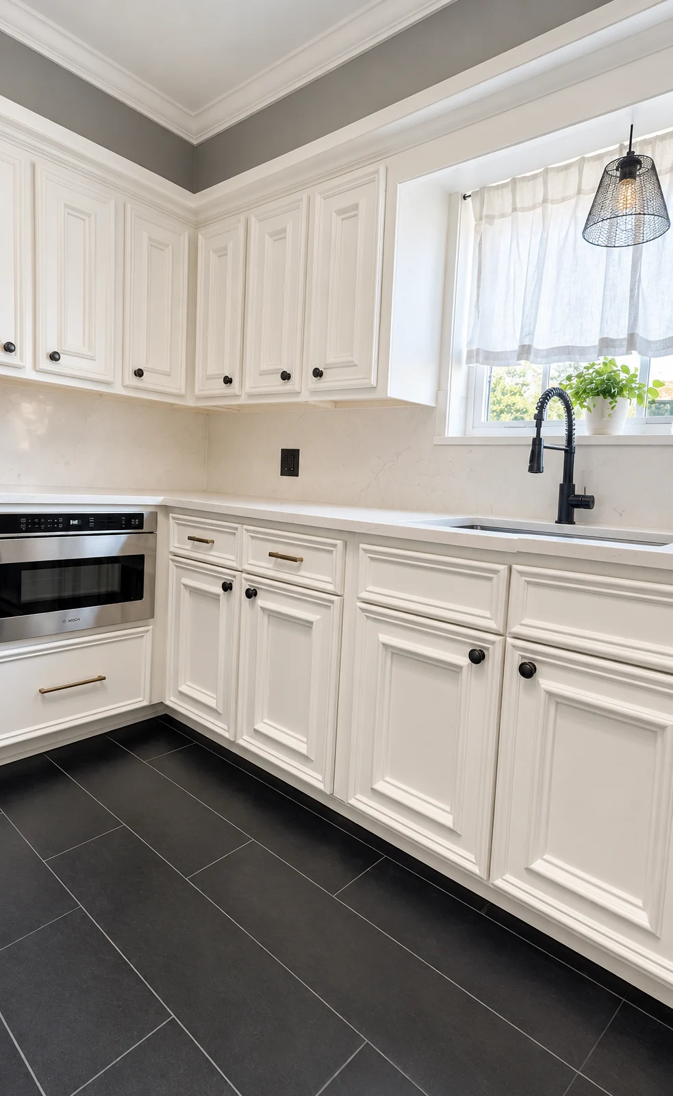 Full kitchen renovation with white cabinetry and stone surfaces · Heights Tx