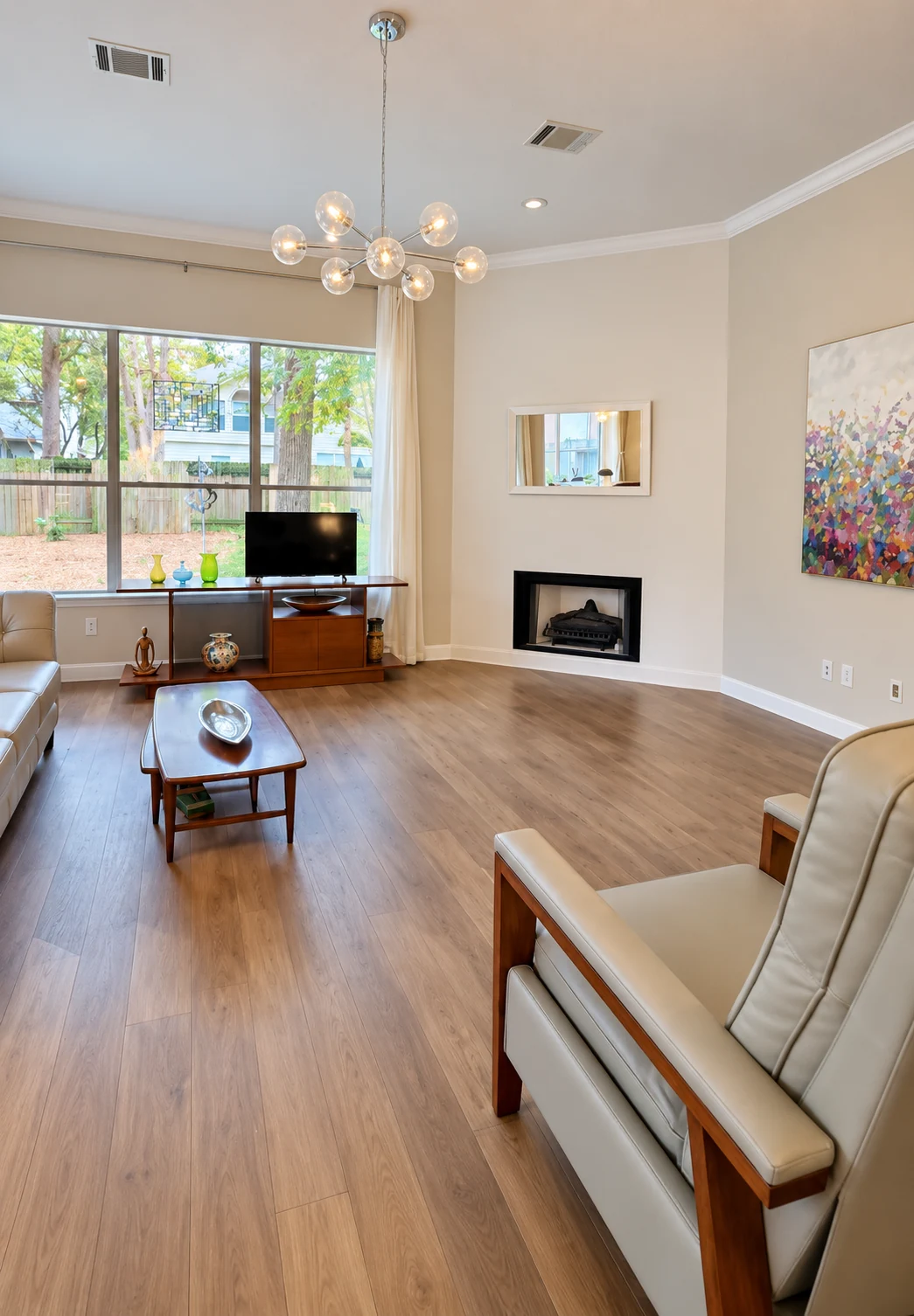 Living room flooring, painted walls and fireplace finishes